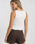 Polera sin mangas mujer buzios blanco