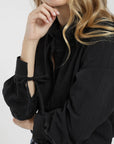 Blusa manga larga Poppy negro