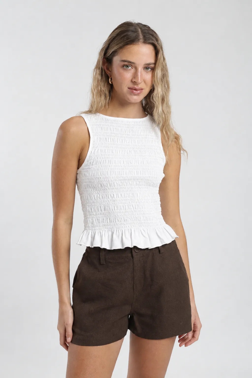 Polera sin mangas mujer buzios blanco Froens