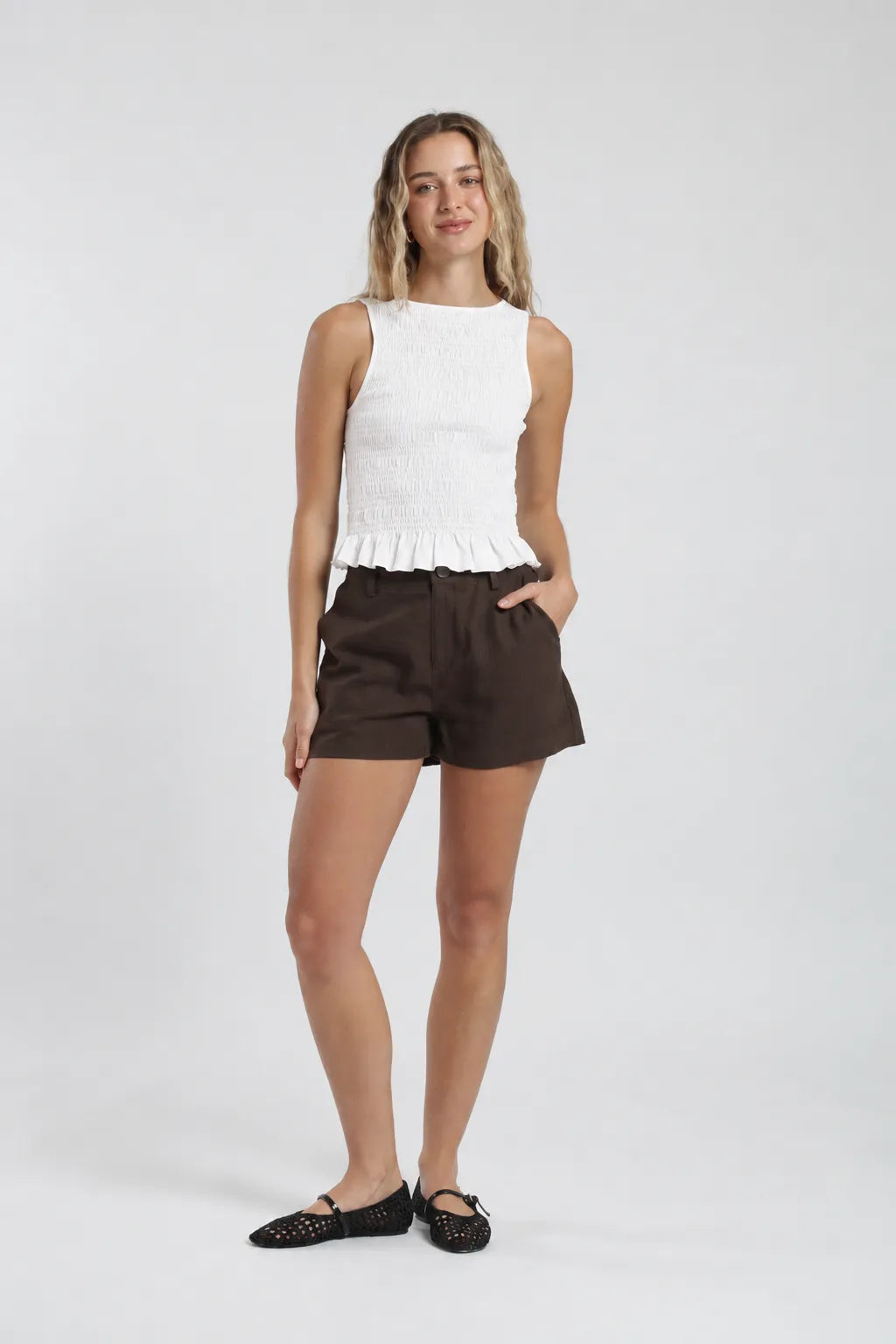Polera sin mangas mujer buzios blanco Froens