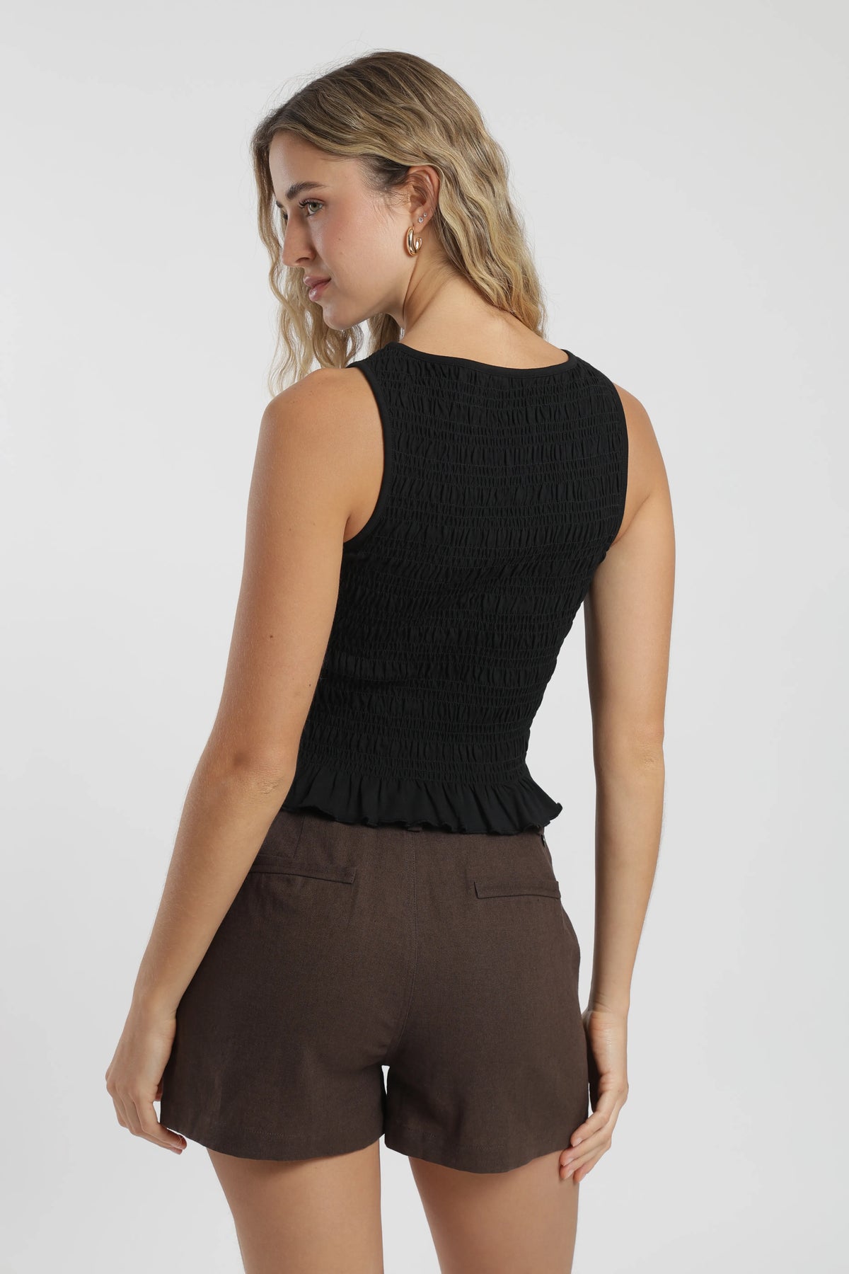 Polera sin mangas mujer buzios negro Froens