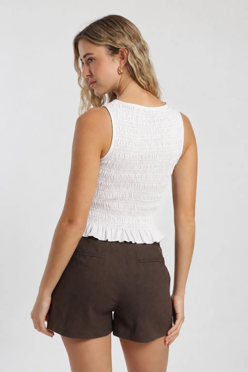 Polera sin mangas mujer buzios blanco Froens